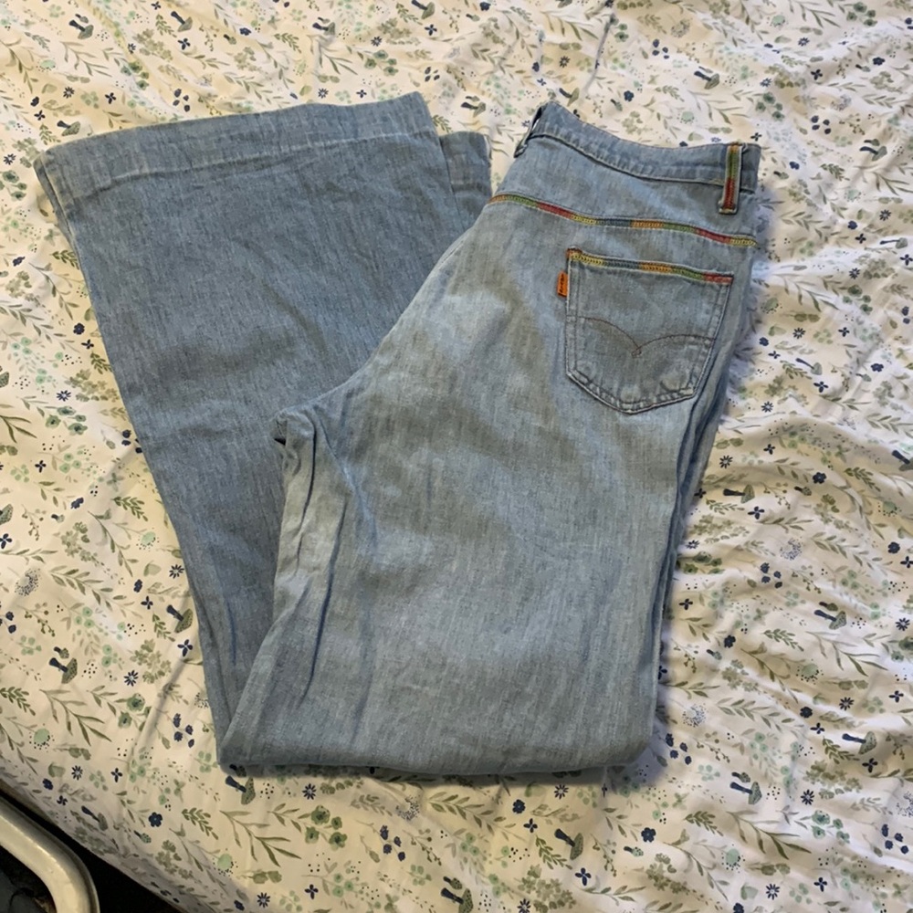 Vintage Levi bell bottoms with rainbow stitching